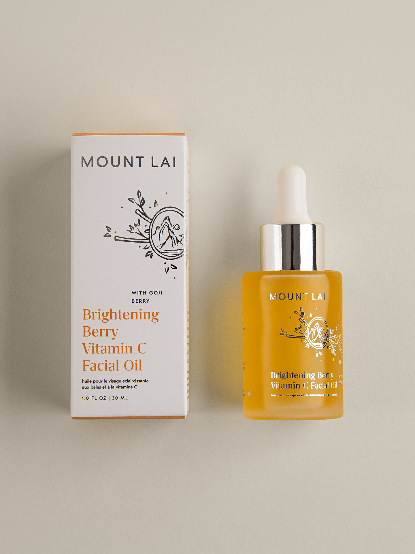 Bottle of Brightening Berry Vitamin C Facial Oil Next to box