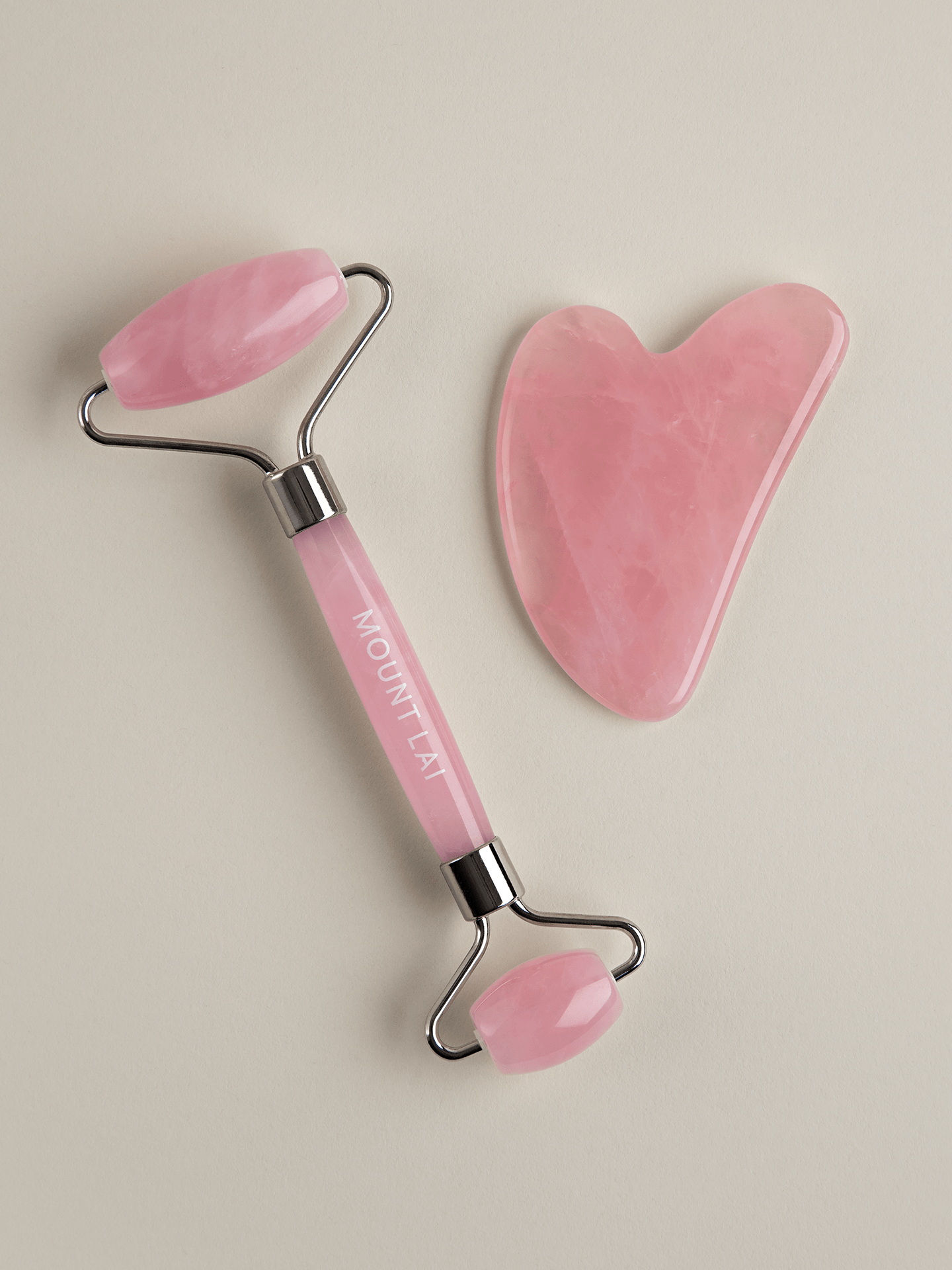 Rose Quartz Facial Spa Set featuring authentic rose quartz gua sha lifting tool and and facial roller