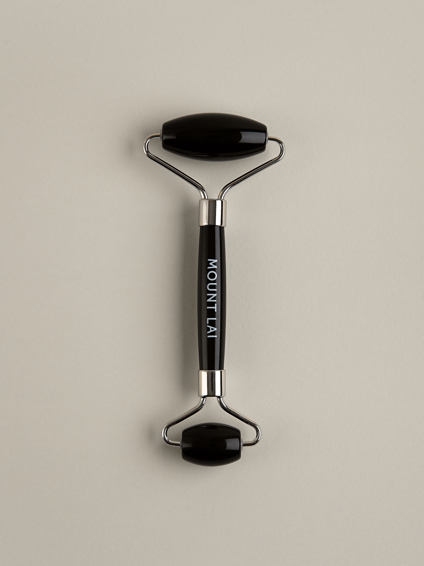 The Warming Black Obsidian Facial Roller