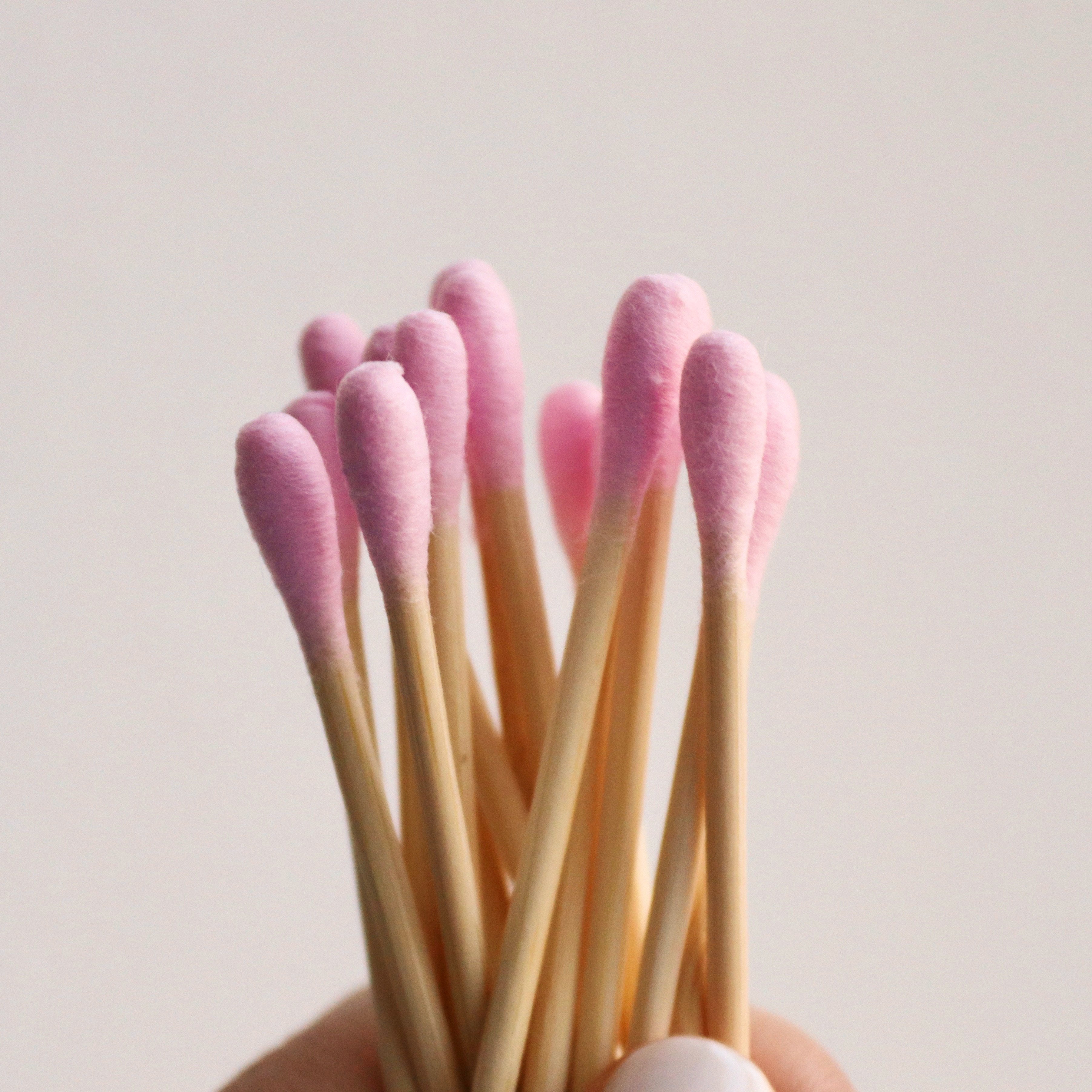 Holding up mei apothecary pink bamboo swaps with pink tips