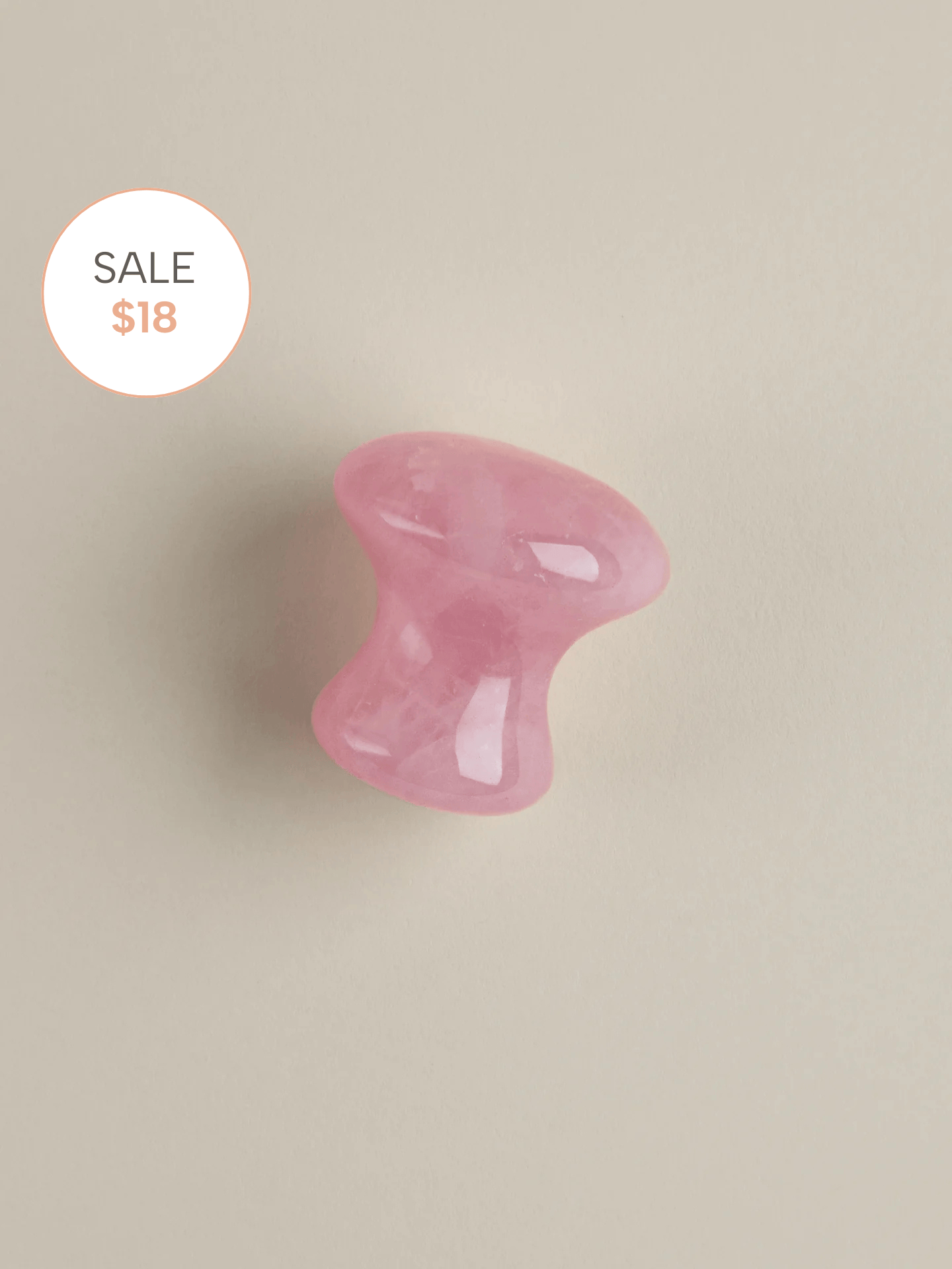 The De-Puffing Rose Quartz Eye Massage Tool