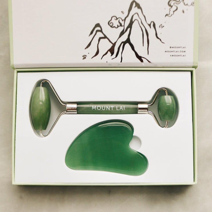 The Jade Gua Sha Tool and Jade De-Puffing Facial Roller. The perfect holiday gift for self care and wellness.