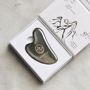 A luxurious stainless steel gua sha tool